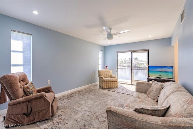 living room with ceiling fan