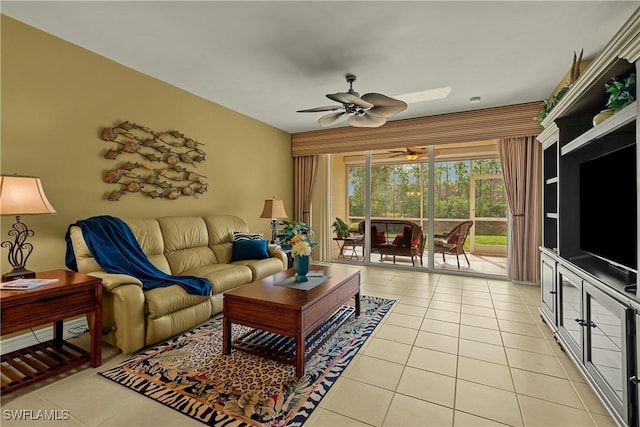 tiled living room featuring ceiling fan