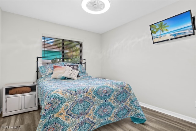 bedroom featuring hardwood / wood-style flooring