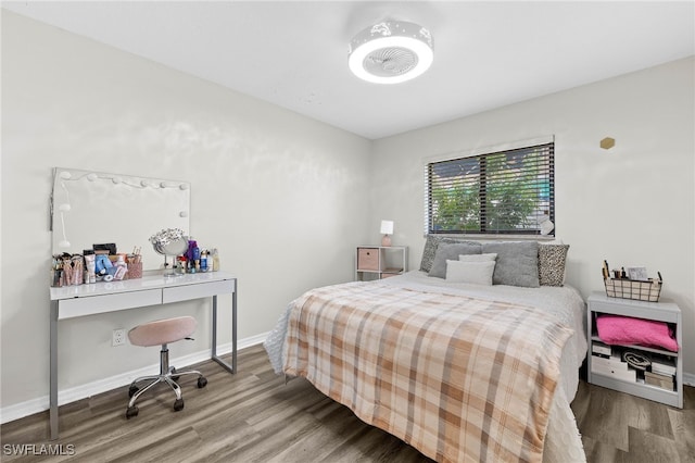 bedroom featuring wood-type flooring