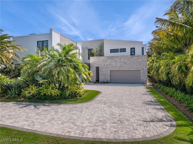 contemporary home featuring a garage