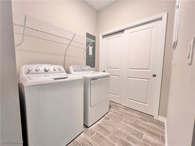 laundry area with washing machine and clothes dryer