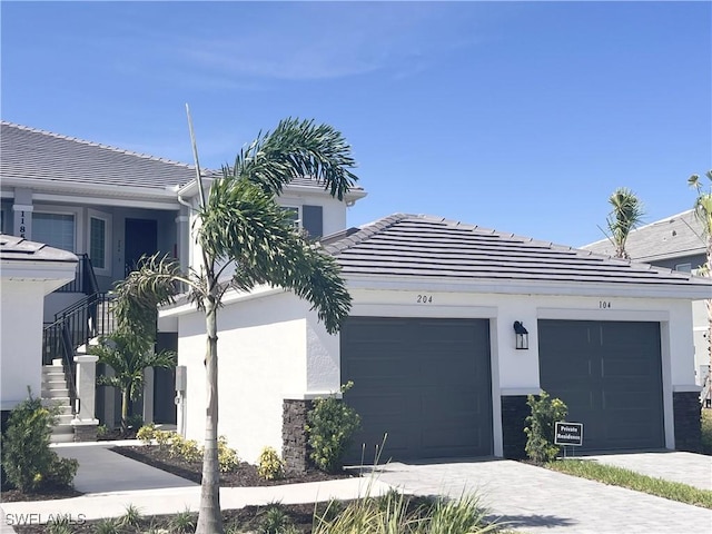 view of front of property with a garage