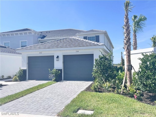 view of front of property featuring a garage