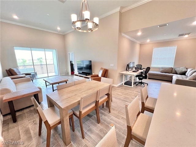 dining room with an inviting chandelier and crown molding