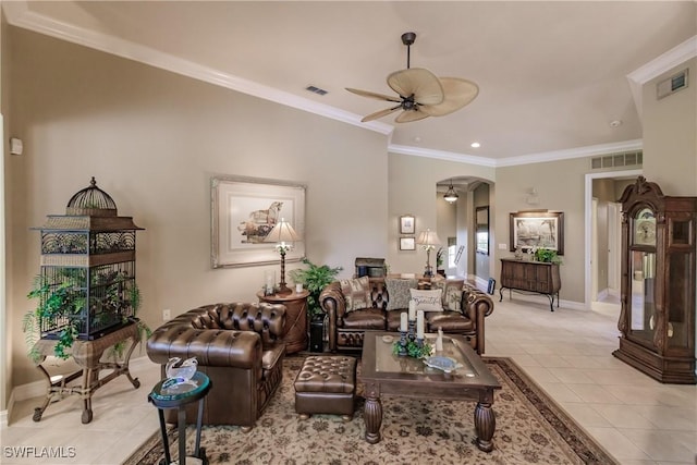 tiled living room featuring ceiling fan and ornamental molding