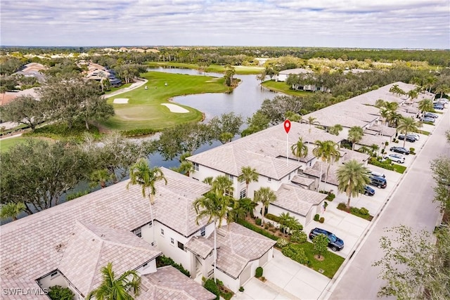 bird's eye view with a residential view, a water view, and view of golf course