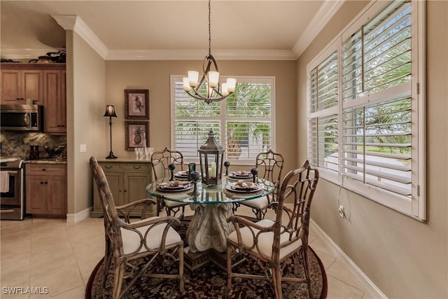 tiled dining room with a chandelier and ornamental molding