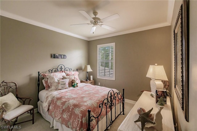 carpeted bedroom featuring ceiling fan, crown molding, and baseboards