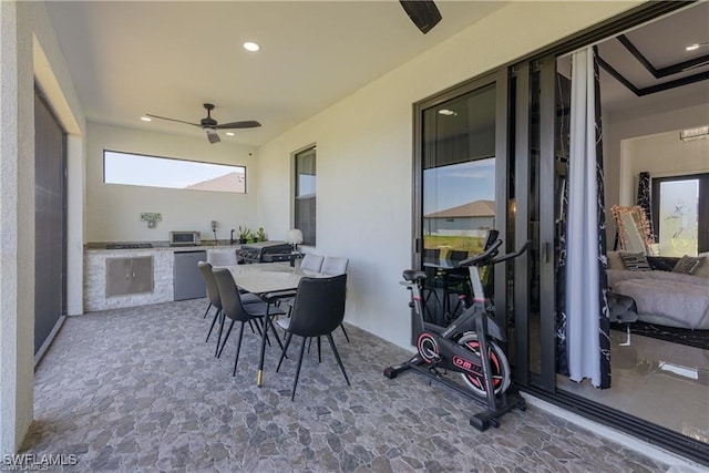 view of patio featuring ceiling fan and area for grilling