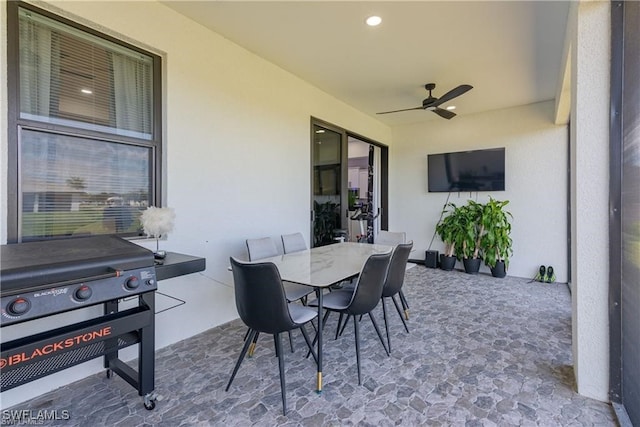 view of patio / terrace featuring ceiling fan