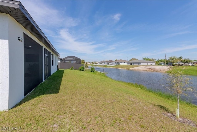 view of yard featuring a water view