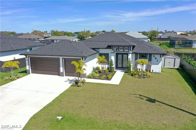 view of front facade with a front lawn and a garage