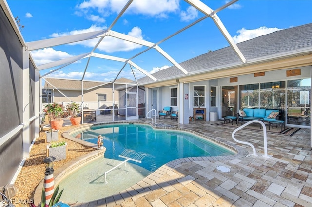 view of swimming pool featuring outdoor lounge area, glass enclosure, and a patio