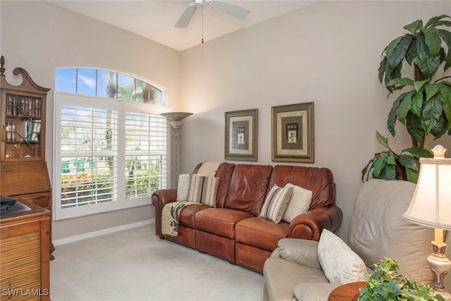 carpeted living room featuring a healthy amount of sunlight and ceiling fan