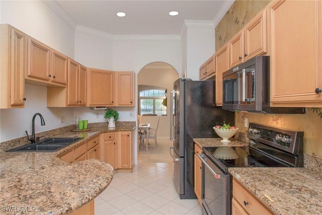 kitchen featuring ornamental molding, black range with electric stovetop, light brown cabinetry, and sink