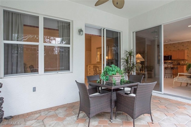 view of patio with ceiling fan