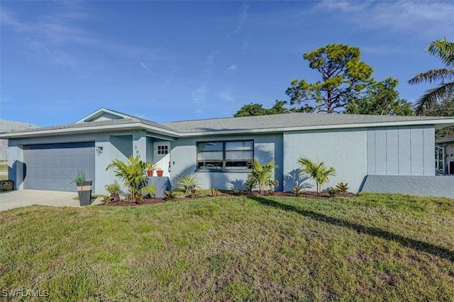 ranch-style home with a front yard and a garage