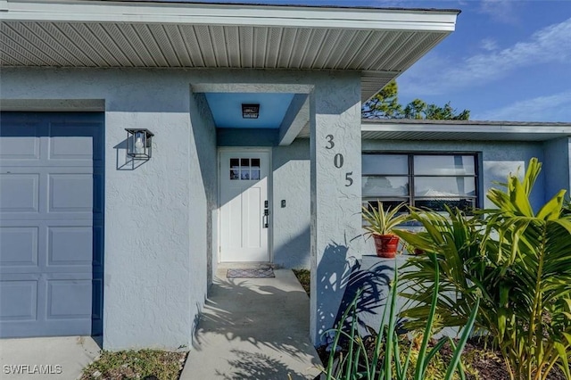 entrance to property with a garage