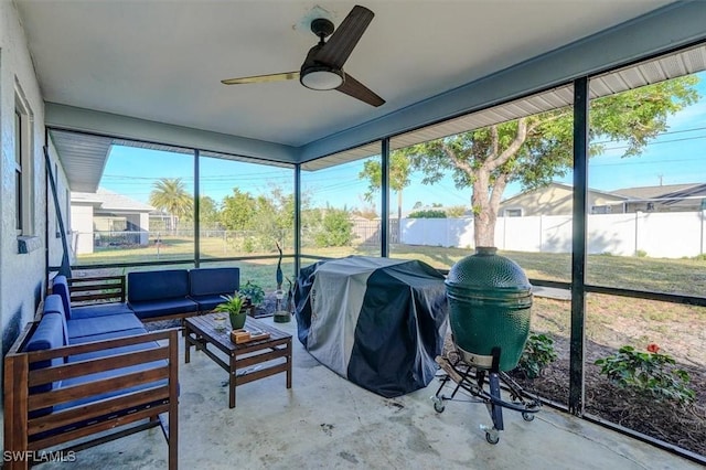 sunroom / solarium with ceiling fan