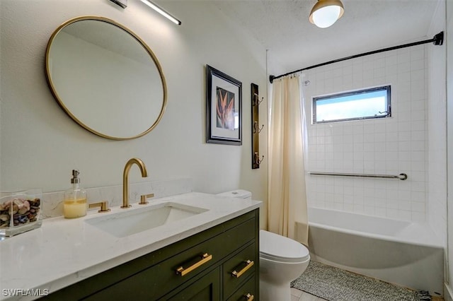 full bathroom with tile patterned flooring, shower / bath combination with curtain, vanity, and toilet