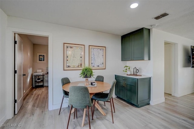 dining area featuring light hardwood / wood-style flooring