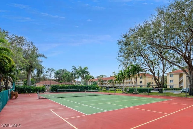 view of sport court with community basketball court and fence