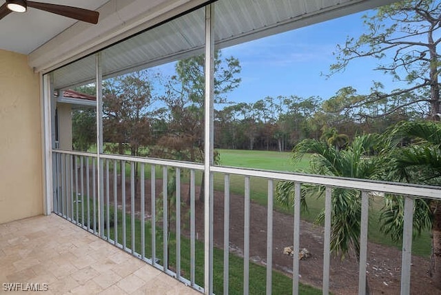 balcony featuring a ceiling fan