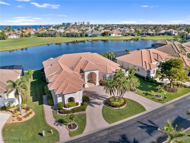 drone / aerial view with a water view