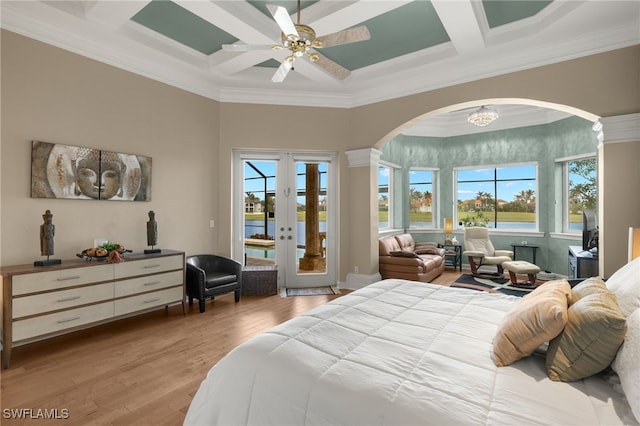 bedroom with access to exterior, ornamental molding, and coffered ceiling