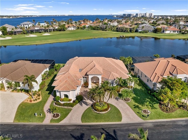 birds eye view of property featuring a water view