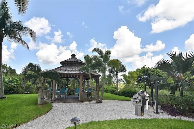 view of home's community with a gazebo and a lawn