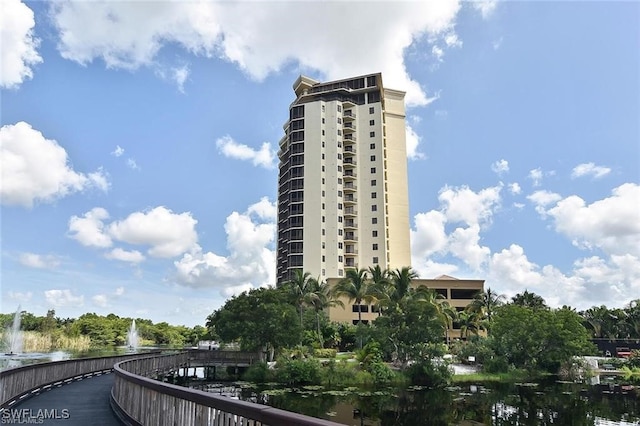 view of property with a water view