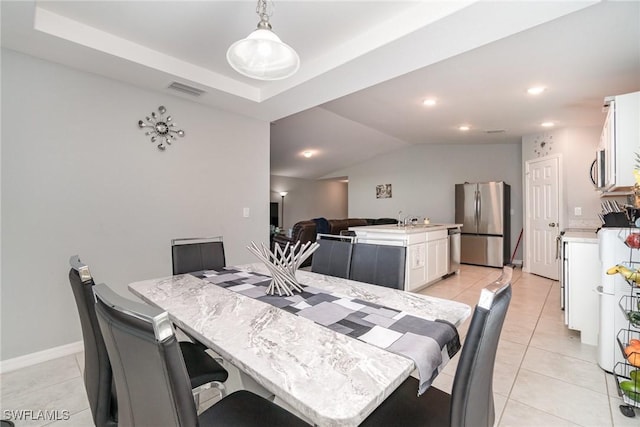 tiled dining space with sink