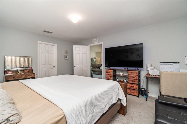 bedroom with light carpet