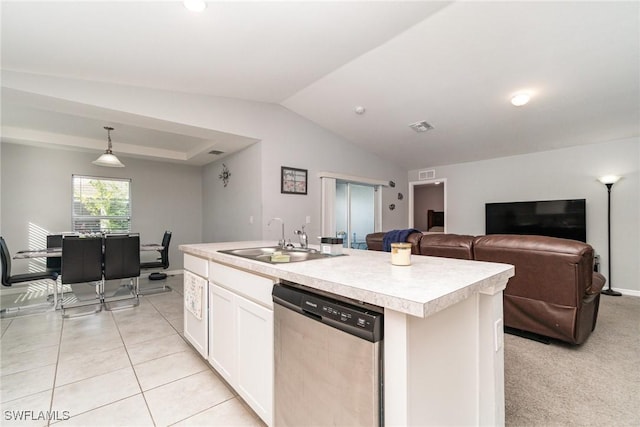 kitchen featuring pendant lighting, dishwasher, sink, white cabinetry, and a kitchen island with sink