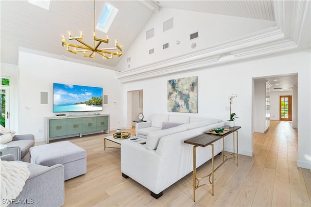 living room with a chandelier, beam ceiling, light wood-type flooring, and high vaulted ceiling