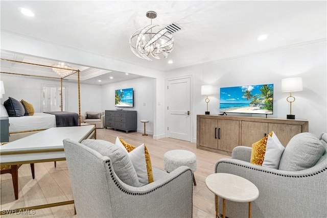 living room with a chandelier, light wood-type flooring, and crown molding