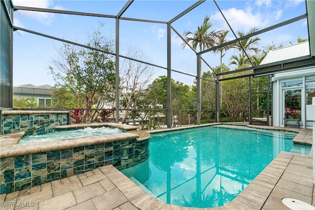 view of pool featuring pool water feature and a lanai