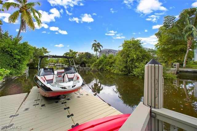 view of dock with a water view