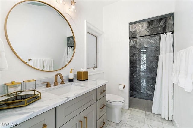 bathroom featuring a shower with curtain, vanity, and toilet