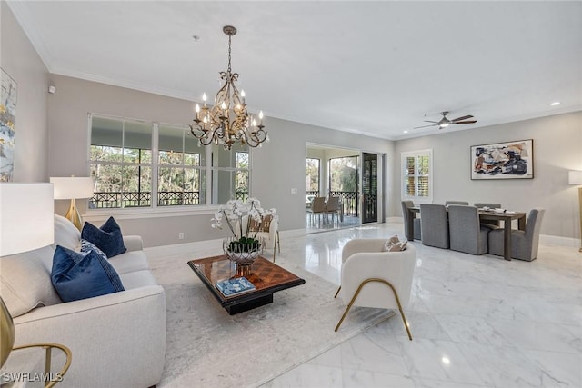 living room with ceiling fan with notable chandelier, a healthy amount of sunlight, and crown molding