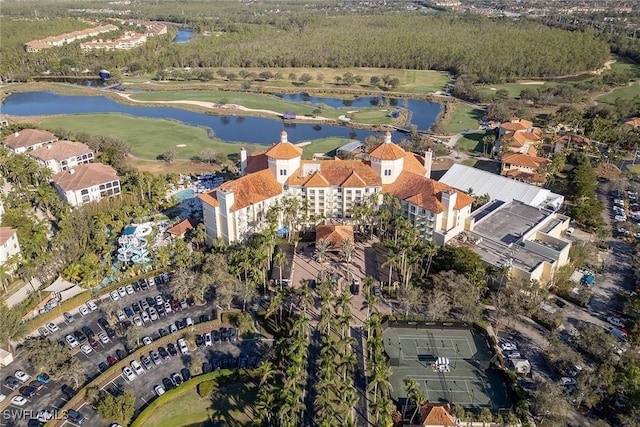 bird's eye view featuring view of golf course and a water view