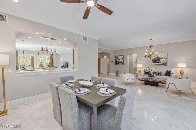 dining area featuring visible vents, marble finish floor, ornamental molding, arched walkways, and baseboards