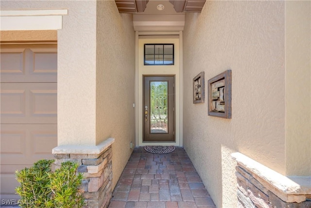 entrance to property with a garage