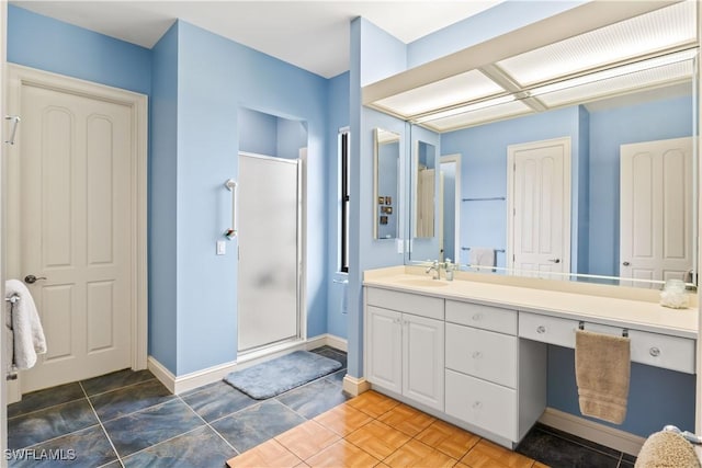 bathroom with vanity and walk in shower