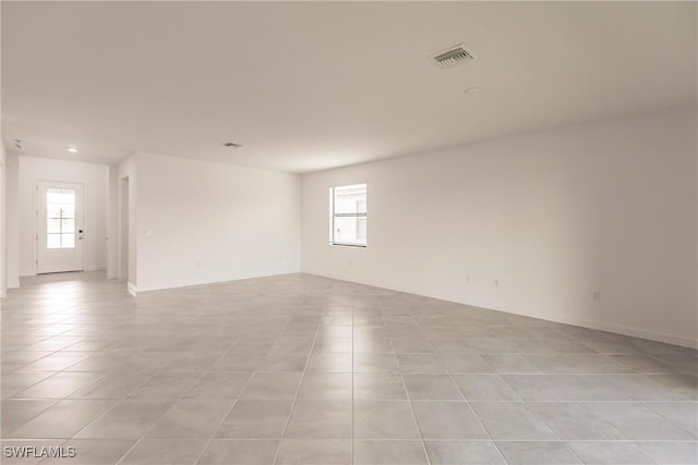 view of tiled spare room