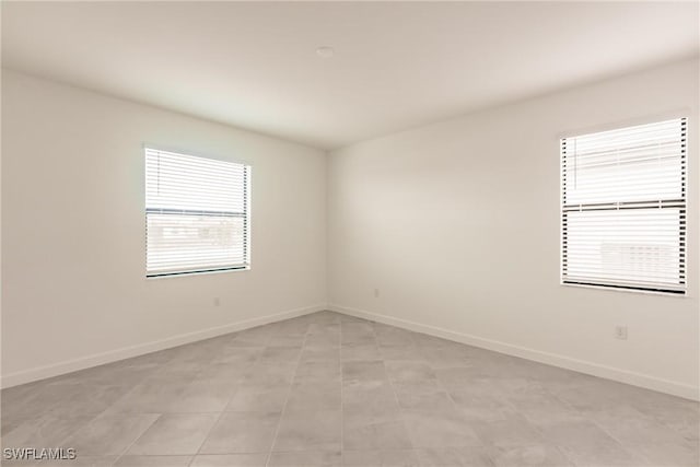 view of tiled spare room