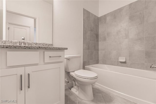 full bathroom with tile patterned floors, vanity, shower / bathtub combination, and toilet