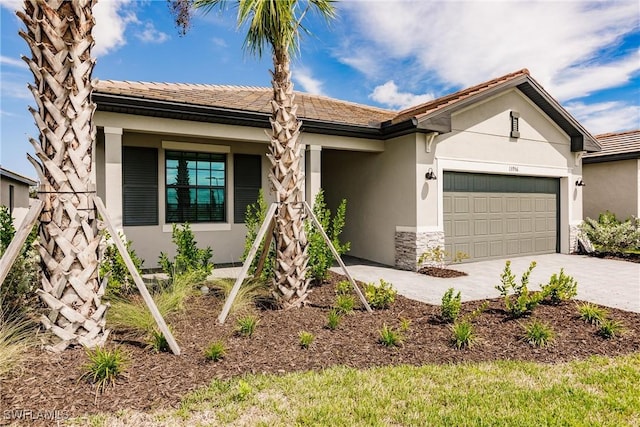 view of front of property with a garage